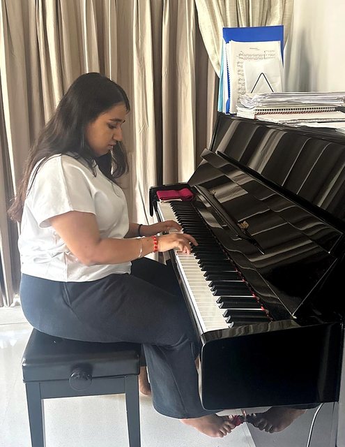 Practising on the piano
